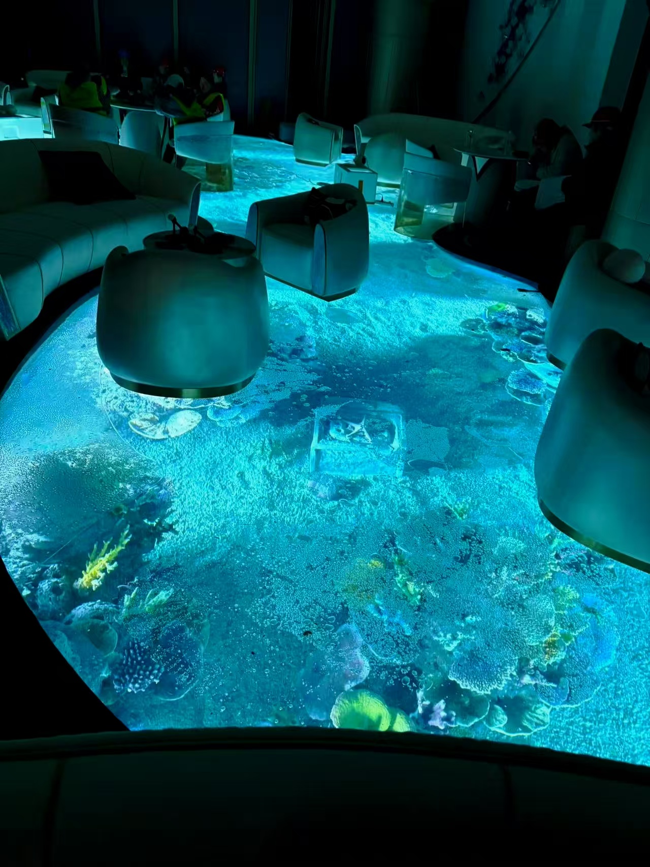 How is the new acrylic material used in aquarium design?